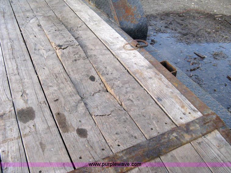 image for item 8196 2007 Load Trail tandem axle flat bed trailer