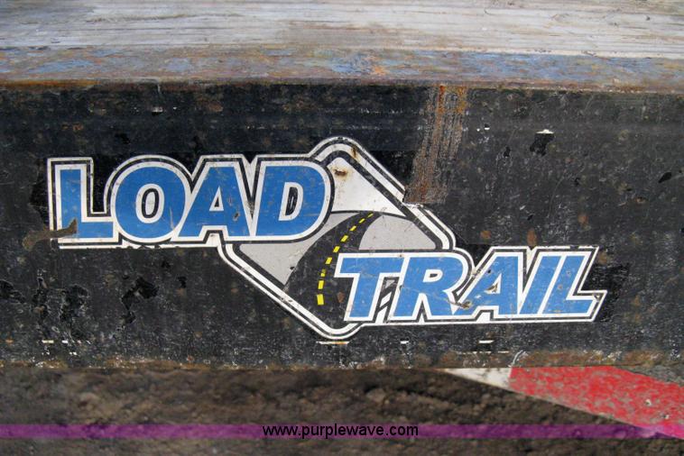 image for item 8196 2007 Load Trail tandem axle flat bed trailer