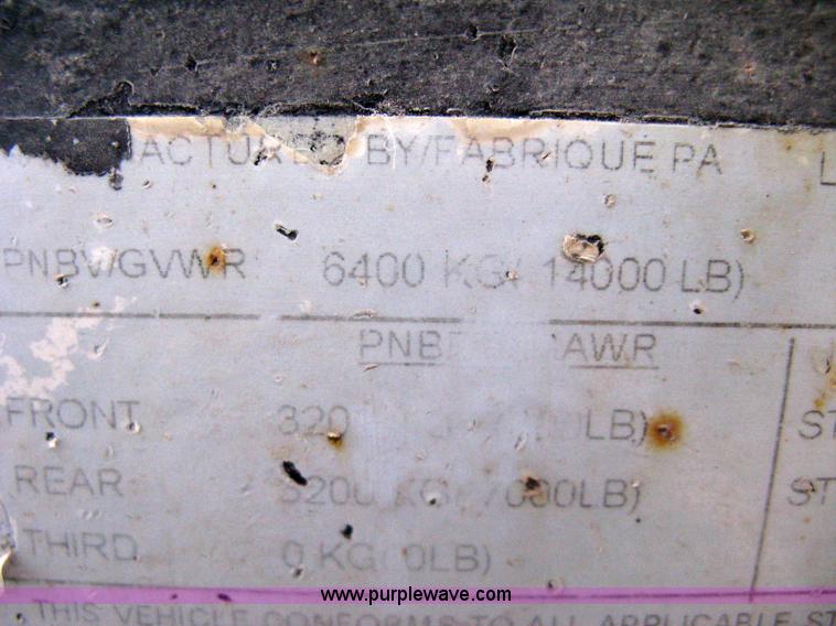 image for item 8196 2007 Load Trail tandem axle flat bed trailer