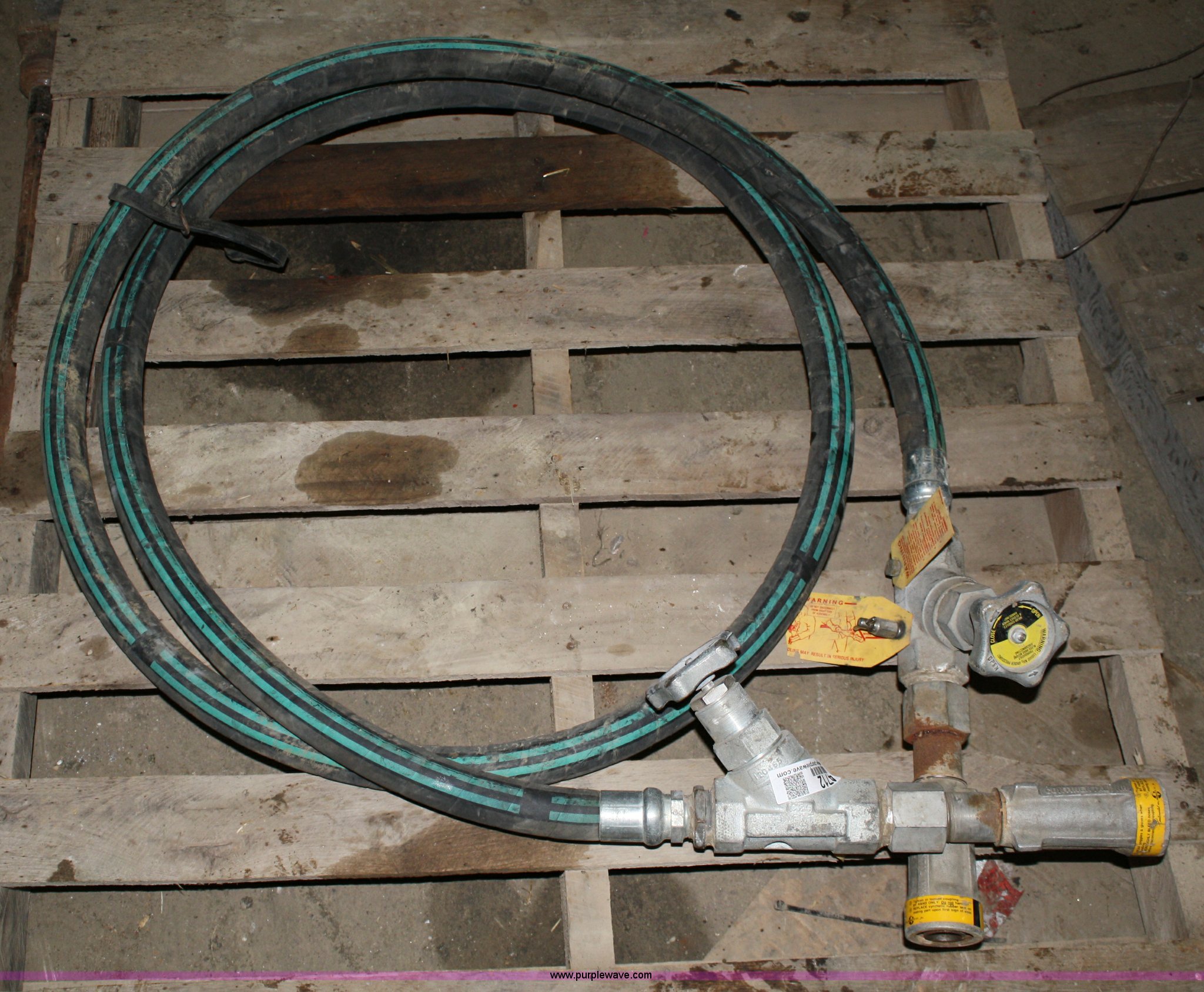 Anhydrous applicator hose in Lawrence, KS Item 4712 sold Purple Wave