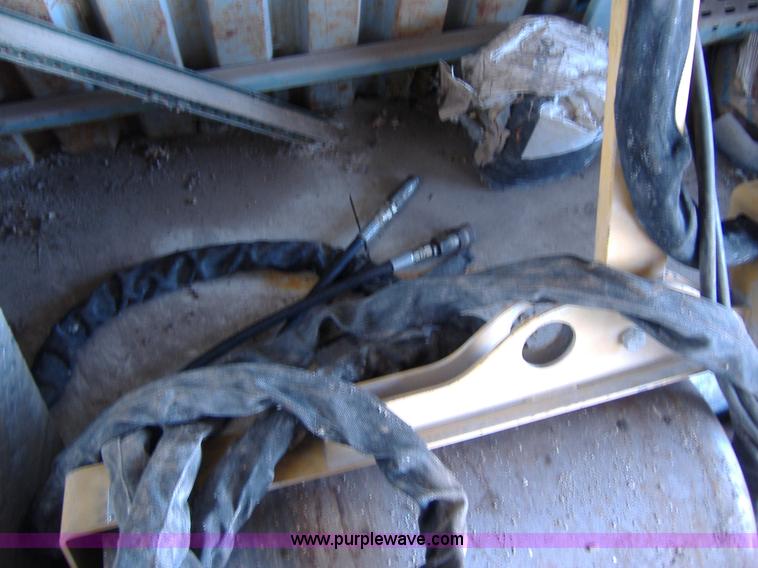 image for item 1502 2009 hydraulic curb machine attachment for skid loader