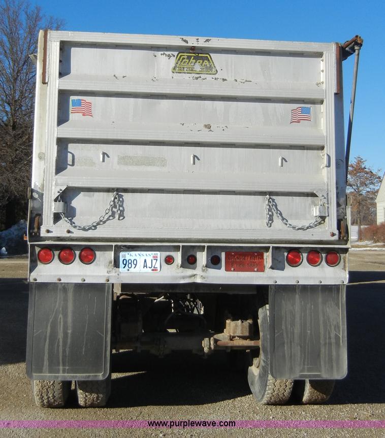 image for item 2140 1985 Cobra 22' end dump trailer