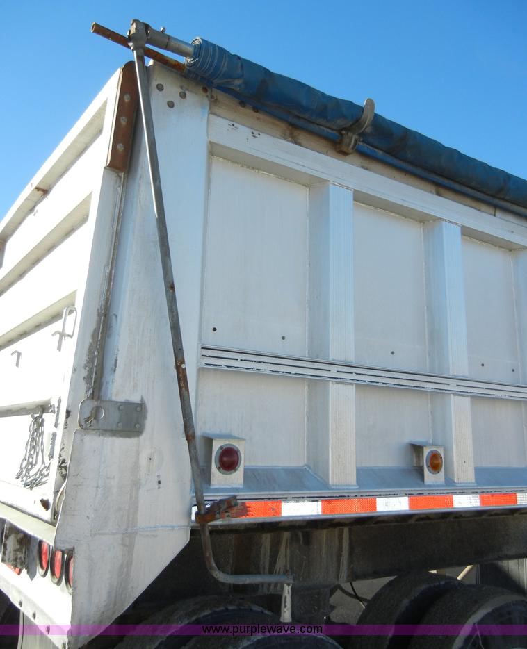 image for item 2140 1985 Cobra 22' end dump trailer