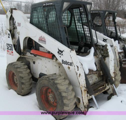 image for item 5574 2004 Bobcat S250 turbo high flow skid steer loader
