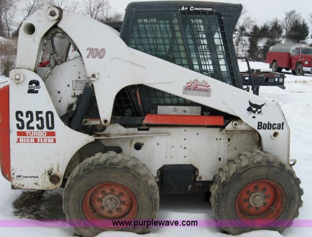 image for item 5574 2004 Bobcat S250 turbo high flow skid steer loader
