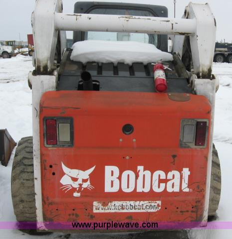 image for item 5574 2004 Bobcat S250 turbo high flow skid steer loader
