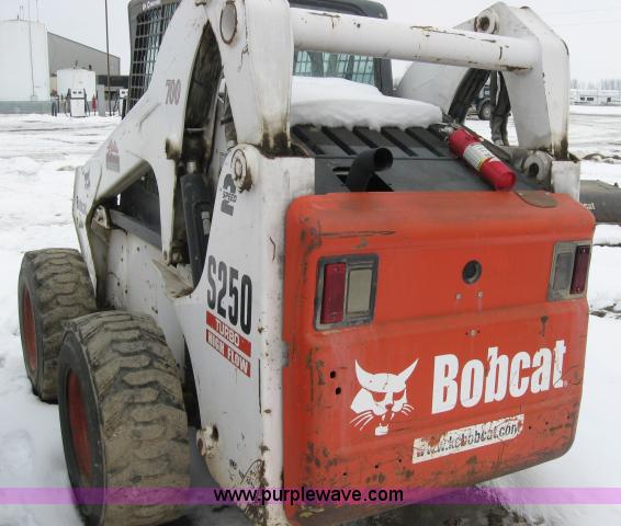 image for item 5574 2004 Bobcat S250 turbo high flow skid steer loader