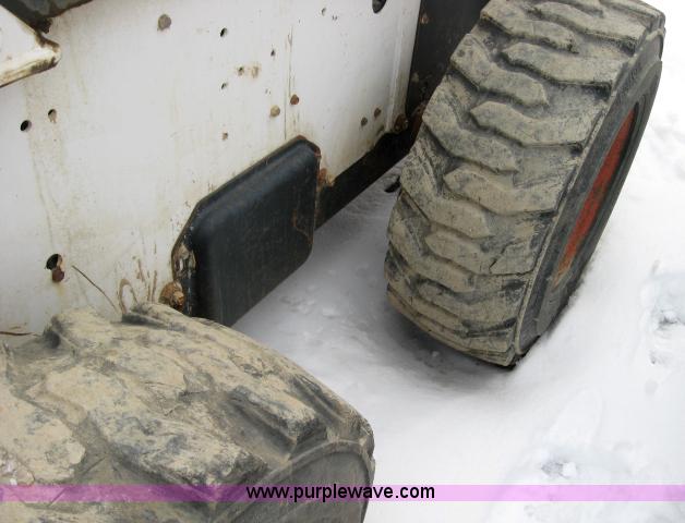 image for item 5574 2004 Bobcat S250 turbo high flow skid steer loader