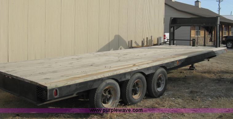 image for item 8147 2007 Shop built triple axle goose neck flatbed trailer