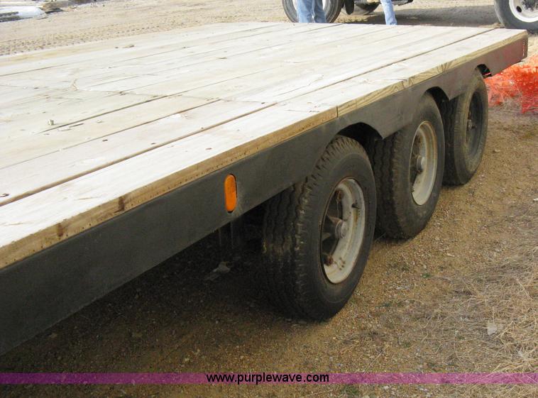 image for item 8147 2007 Shop built triple axle goose neck flatbed trailer