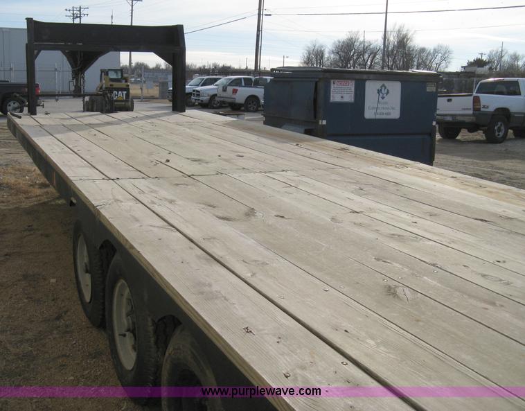 image for item 8147 2007 Shop built triple axle goose neck flatbed trailer