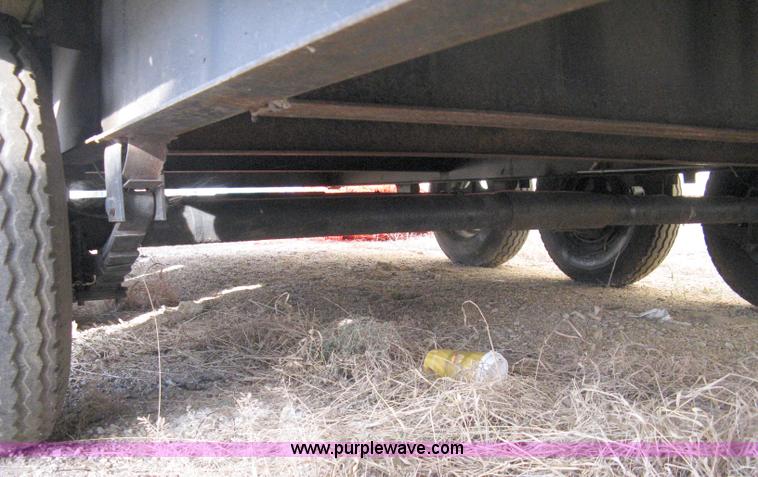 image for item 8147 2007 Shop built triple axle goose neck flatbed trailer