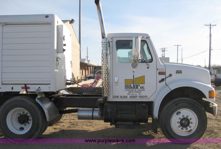 image for item 8149 1995 International 4700 single axle semi truck