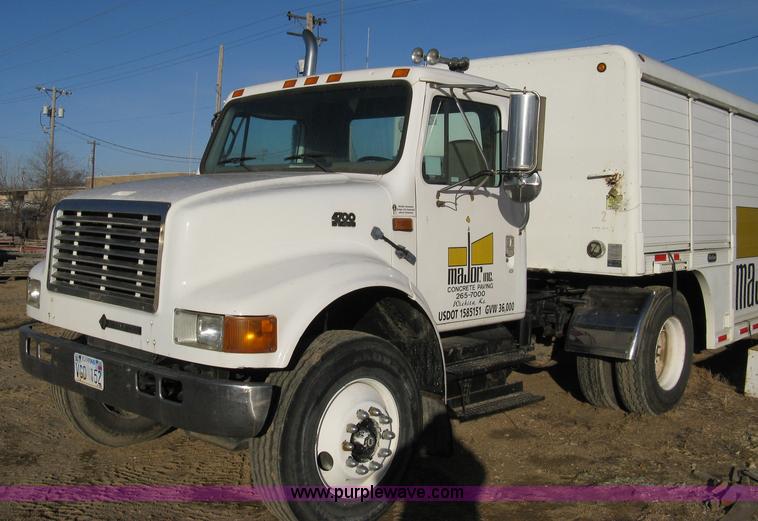 image for item 8149 1995 International 4700 single axle semi truck