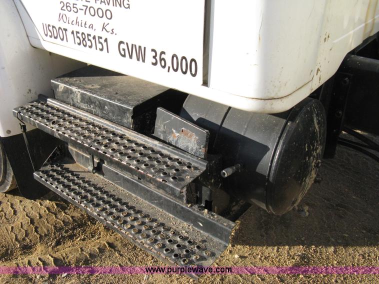 image for item 8149 1995 International 4700 single axle semi truck