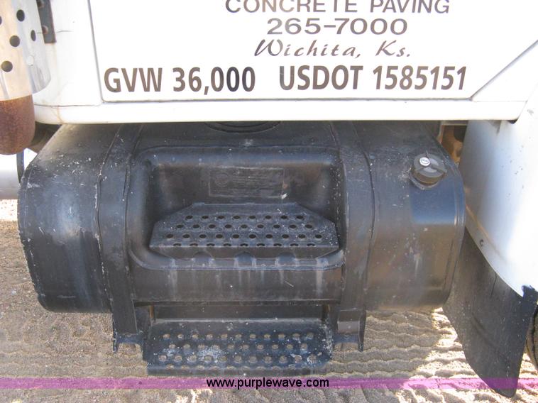 image for item 8149 1995 International 4700 single axle semi truck