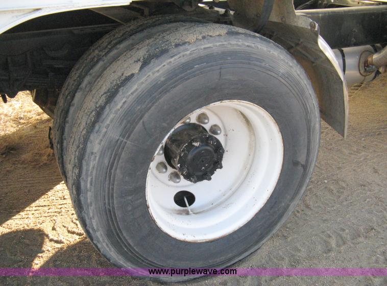 image for item 8149 1995 International 4700 single axle semi truck