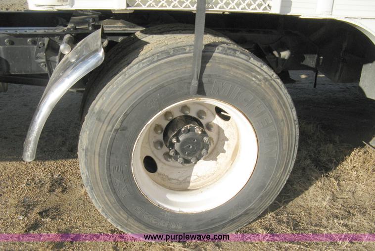 image for item 8149 1995 International 4700 single axle semi truck