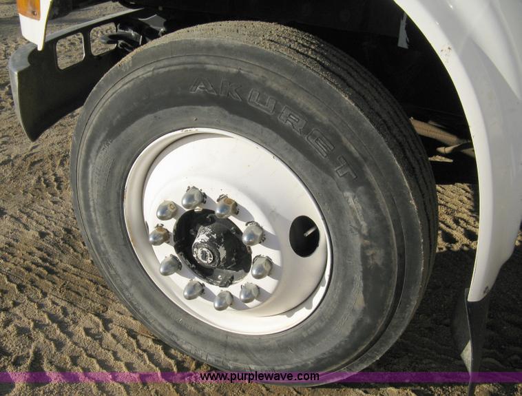 image for item 8149 1995 International 4700 single axle semi truck