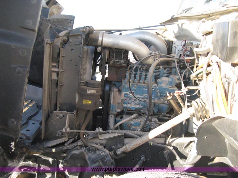 image for item 8149 1995 International 4700 single axle semi truck