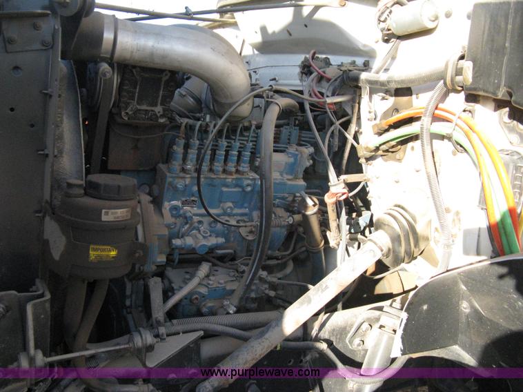 image for item 8149 1995 International 4700 single axle semi truck