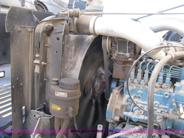 image for item 8149 1995 International 4700 single axle semi truck