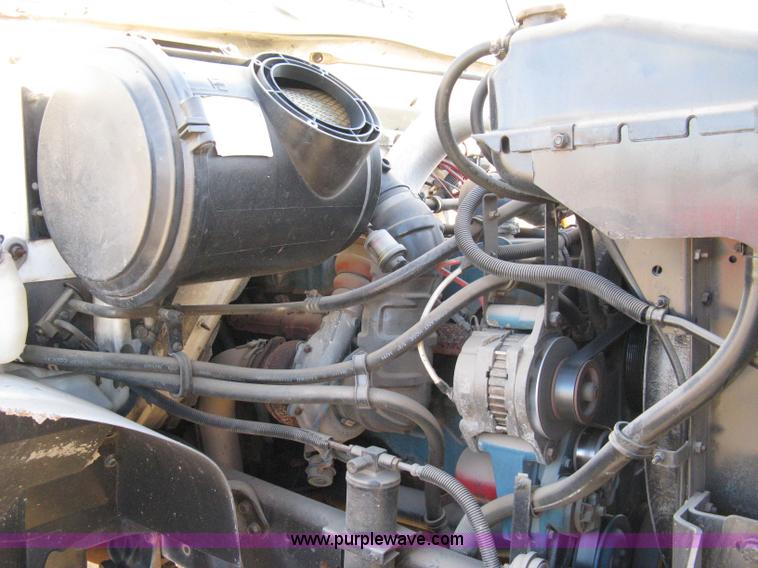 image for item 8149 1995 International 4700 single axle semi truck