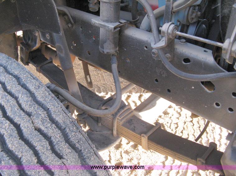 image for item 8149 1995 International 4700 single axle semi truck