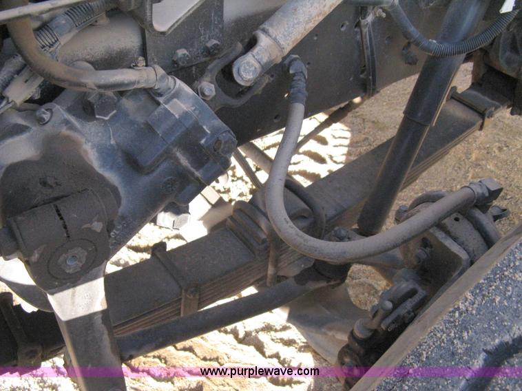 image for item 8149 1995 International 4700 single axle semi truck