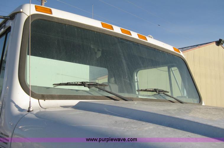 image for item 8149 1995 International 4700 single axle semi truck