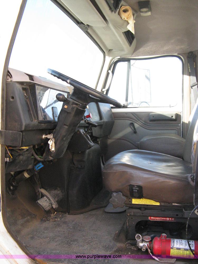 image for item 8149 1995 International 4700 single axle semi truck