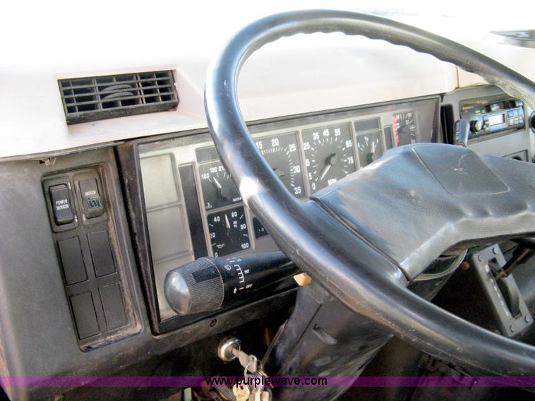 image for item 8149 1995 International 4700 single axle semi truck