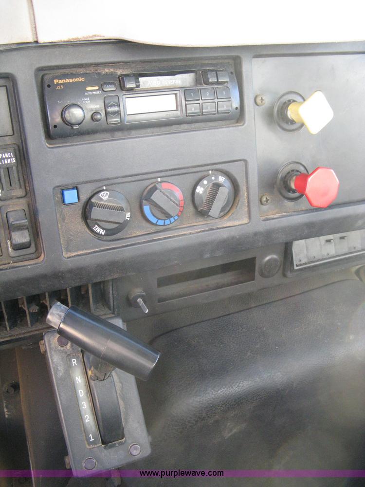 image for item 8149 1995 International 4700 single axle semi truck