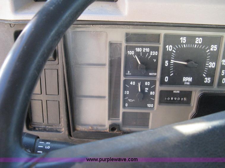 image for item 8149 1995 International 4700 single axle semi truck