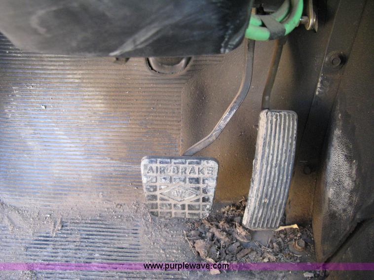 image for item 8149 1995 International 4700 single axle semi truck