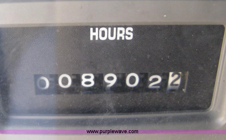 image for item 8149 1995 International 4700 single axle semi truck