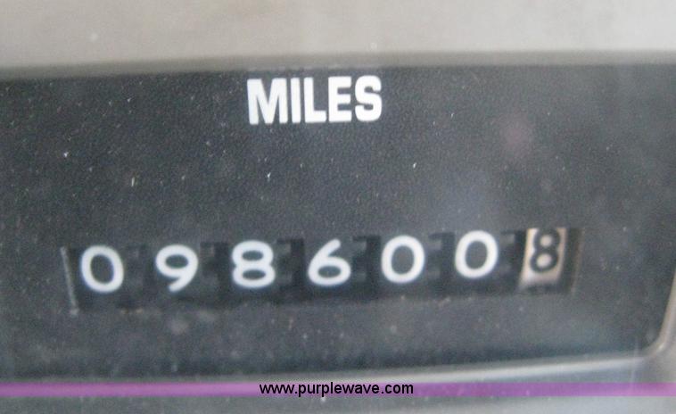 image for item 8149 1995 International 4700 single axle semi truck