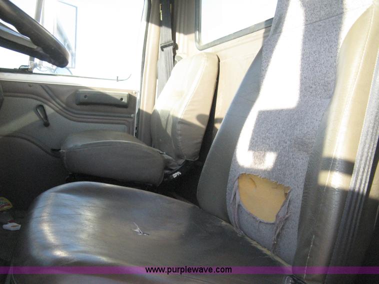 image for item 8149 1995 International 4700 single axle semi truck