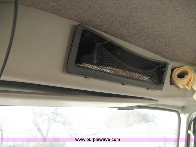 image for item 8149 1995 International 4700 single axle semi truck