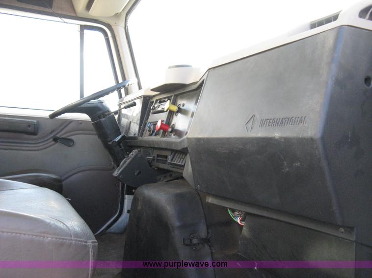 image for item 8149 1995 International 4700 single axle semi truck