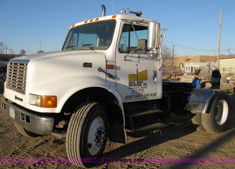 image for item 8149 1995 International 4700 single axle semi truck