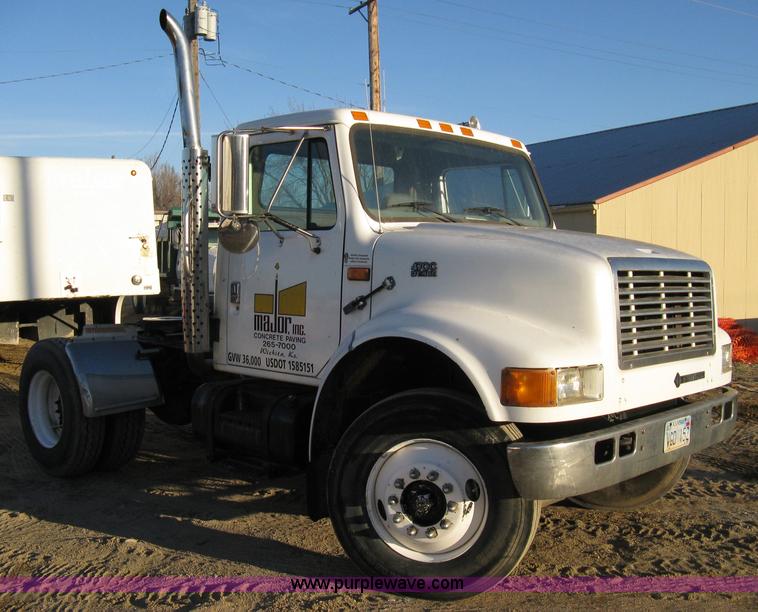 image for item 8149 1995 International 4700 single axle semi truck