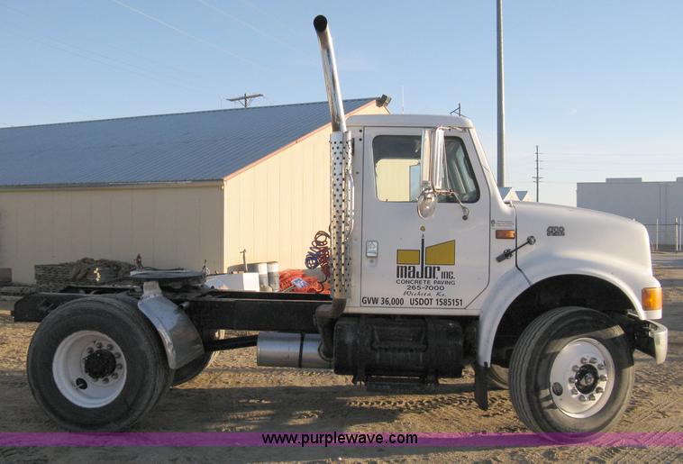 image for item 8149 1995 International 4700 single axle semi truck