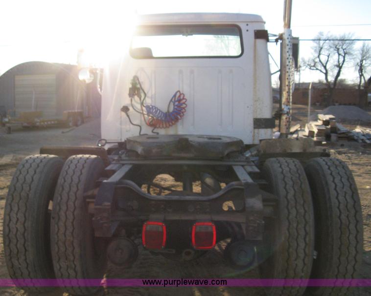 image for item 8149 1995 International 4700 single axle semi truck