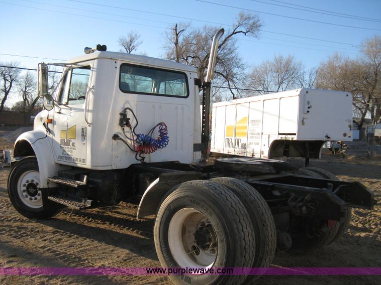 image for item 8149 1995 International 4700 single axle semi truck