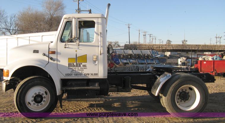 image for item 8149 1995 International 4700 single axle semi truck