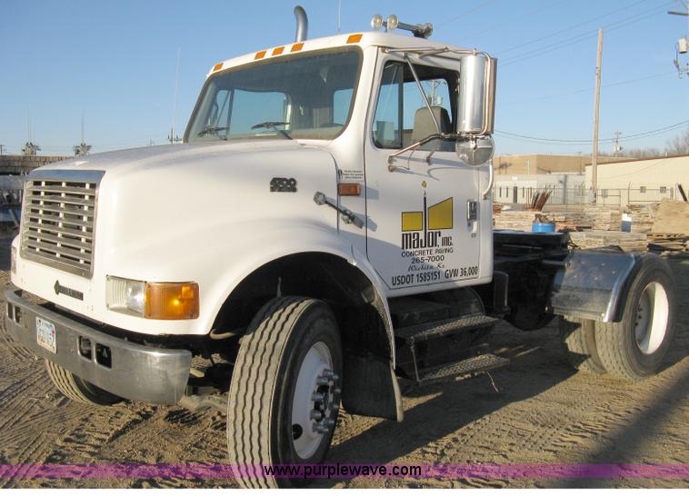 image for item 8149 1995 International 4700 single axle semi truck