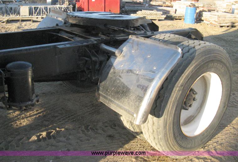 image for item 8149 1995 International 4700 single axle semi truck