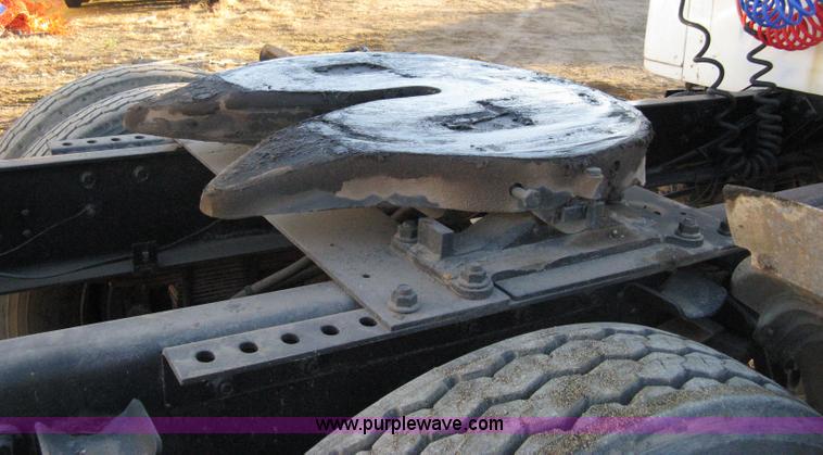 image for item 8149 1995 International 4700 single axle semi truck