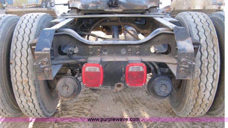 image for item 8149 1995 International 4700 single axle semi truck